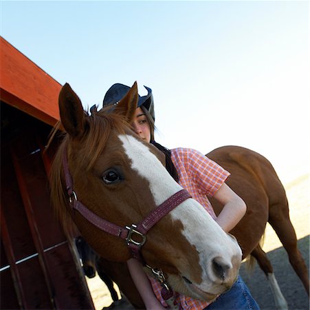 Teenage Girl With Her Pet Horse Stock Photo - Rights-Managed, Code: 700-00593047
