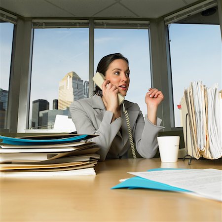 Businesswoman On the Phone At Her Desk Stock Photo - Rights-Managed, Code: 700-00593066