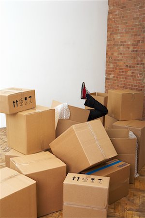 frustrated person and storage - Man Falling Into Cardboard Boxes Stock Photo - Rights-Managed, Code: 700-00604408
