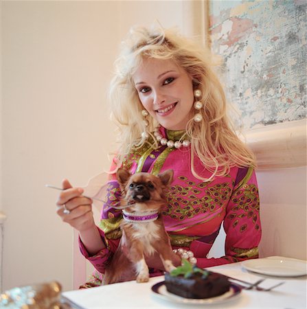dog faking woman - Woman at Table with Chihuahua Stock Photo - Rights-Managed, Code: 700-00604926