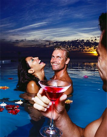 party couple pool - Gens dans la piscine Photographie de stock - Rights-Managed, Code: 700-00605032