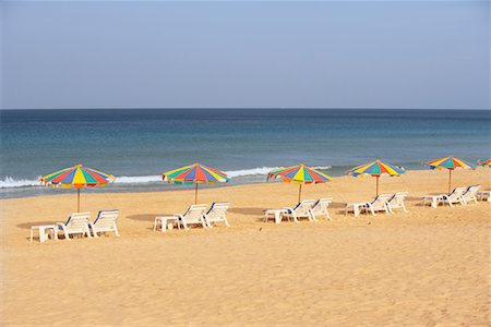 row of beach chairs - Beach Umbrellas and Chairs on Karon Beach, Phuket, Thailand Stock Photo - Rights-Managed, Code: 700-00605159