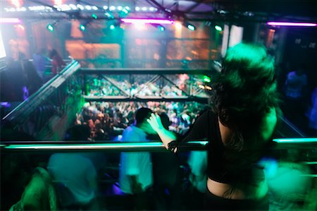 people dancing in night club with arms in air - Dancing in Nightclub, Buzios, Rio de Janeiro, Brazil Stock Photo - Rights-Managed, Code: 700-00606161