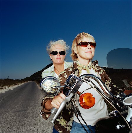 simsearch:700-00458301,k - Two Women Riding Motorcycle Fotografie stock - Rights-Managed, Codice: 700-00606356