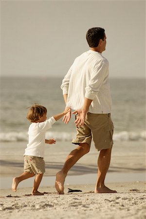 father son caucasian walking two people casual clothing - Father and Son at the Beach Stock Photo - Rights-Managed, Code: 700-00606357