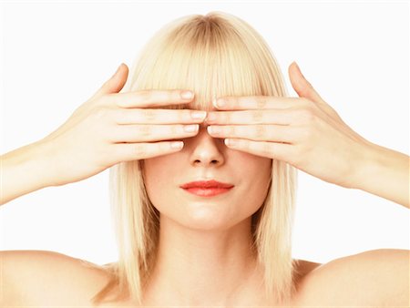 Femme couvrant yeux avec les mains Photographie de stock - Rights-Managed, Code: 700-00606448