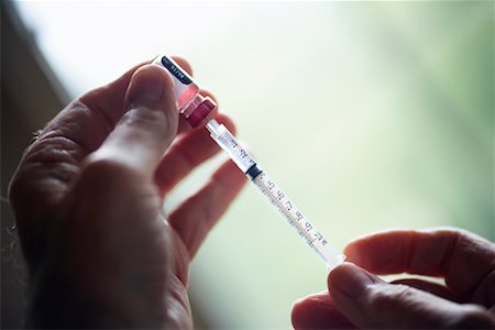 diabetes man - Close-up Of Needle Being Prepared Stock Photo - Rights-Managed, Code: 700-00607063