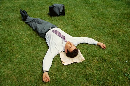 simsearch:700-00611221,k - Businessman Lying on Grass Stock Photo - Rights-Managed, Code: 700-00607134