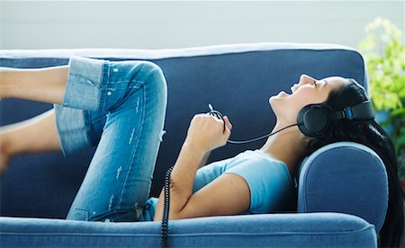 singing couch - Woman Listening to Music Stock Photo - Rights-Managed, Code: 700-00607696