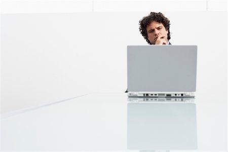 simsearch:700-00607836,k - Businessman Using Laptop Stock Photo - Rights-Managed, Code: 700-00607804