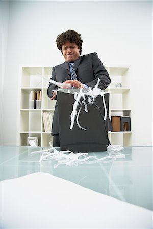 Businessman Shredding Documents Fotografie stock - Rights-Managed, Codice: 700-00607838