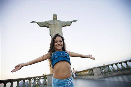 rio de janeiro entertainment pictures - Girl by Christ Statue, Corcovado Mountain, Rio de Janeiro, Brazil Stock Photo - Rights-Managed, Code: 700-00607925