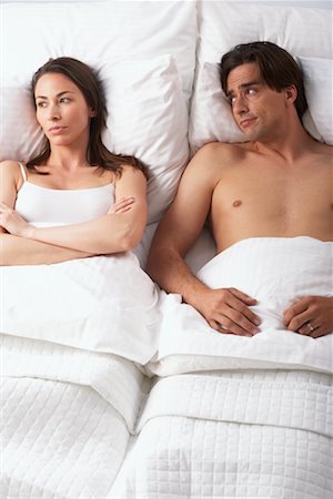 Couple Having Argument in Bed Foto de stock - Con derechos protegidos, Código: 700-00608040