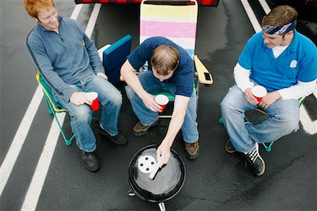 fans group day party - Men at Tailgate Party Stock Photo - Rights-Managed, Code: 700-00608834