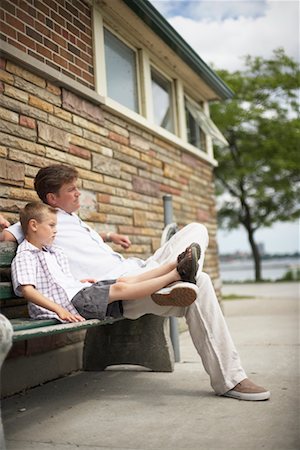 father son sitting on a bench - Father and Son Outdoors Stock Photo - Rights-Managed, Code: 700-00609087