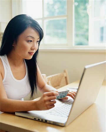 simsearch:700-00280412,k - Woman Using Laptop at Home Stock Photo - Rights-Managed, Code: 700-00609247