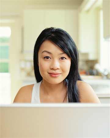 simsearch:700-00151235,k - Woman Using Laptop at Home Stock Photo - Rights-Managed, Code: 700-00609243