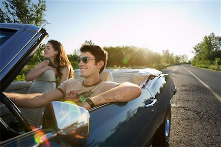 Couple in Backseat of Convertible Stock Photo - Rights-Managed, Code: 700-00609414