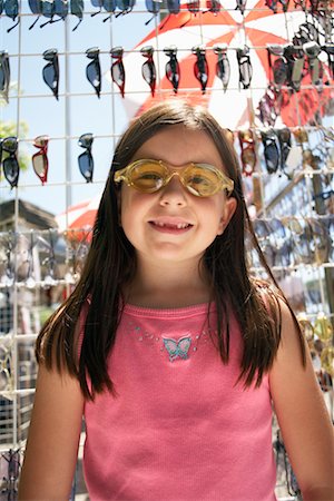 Girl Trying on Sunglasses Stock Photo - Rights-Managed, Code: 700-00609504