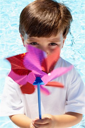 Boy Holding Pinwheel Stock Photo - Rights-Managed, Code: 700-00609509