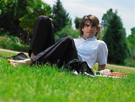 simsearch:700-00611221,k - Man Sitting on Grass Stock Photo - Rights-Managed, Code: 700-00609894