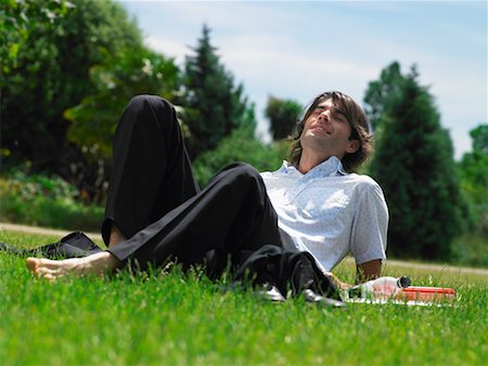 simsearch:700-00611221,k - Man Sitting on Grass Stock Photo - Rights-Managed, Code: 700-00609895