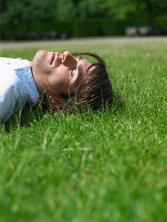simsearch:700-00611221,k - Man Lying on Grass Stock Photo - Rights-Managed, Code: 700-00609896
