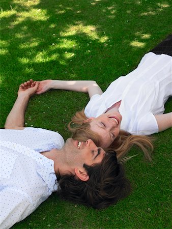 simsearch:700-00611221,k - Couple Lying on Grass Stock Photo - Rights-Managed, Code: 700-00609892