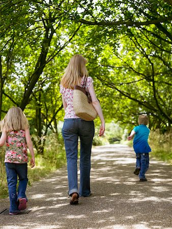 Mother Walking with Children Stock Photo - Rights-Managed, Code: 700-00609901