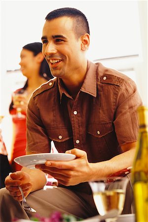 dinner party friends indoors young adults - Man at Party Stock Photo - Rights-Managed, Code: 700-00609943