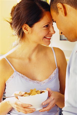 Couple with Bowl of Cereal Stock Photo - Rights-Managed, Code: 700-00609951