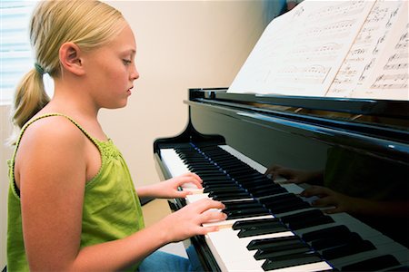 piano practice - Girl Playing Piano Stock Photo - Rights-Managed, Code: 700-00616884