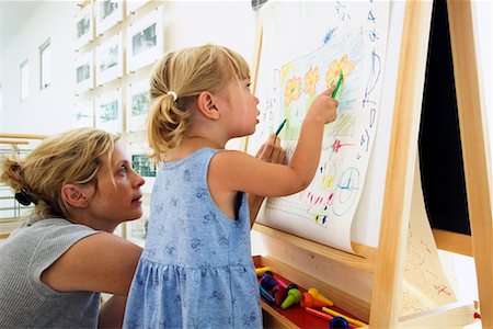 school kneeling - Mother and Daughter Colouring Stock Photo - Rights-Managed, Code: 700-00616900