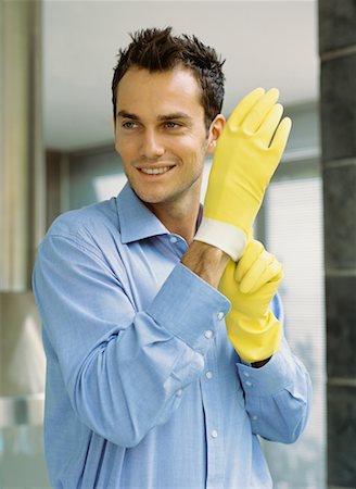 photo pose fireplace - Portrait of Man Putting on Rubber Glove Stock Photo - Rights-Managed, Code: 700-00617396
