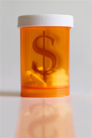dollar sign of pills - Pill Bottle with Dollar Sign Stock Photo - Rights-Managed, Code: 700-00617783