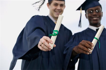 Graduates Holding Diplomas Stock Photo - Rights-Managed, Code: 700-00617973