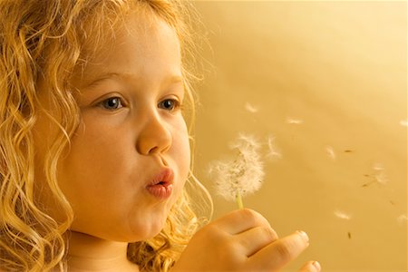 Girl Blowing on Dandelion Stock Photo - Rights-Managed, Code: 700-00617999
