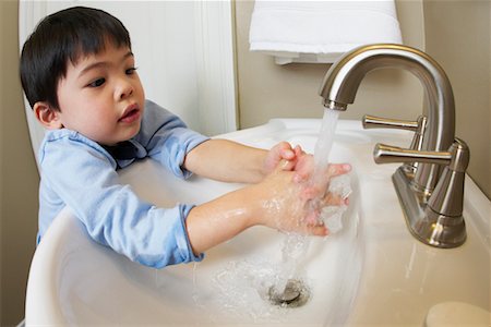 Boy Washing His Hands Stock Photo - Rights-Managed, Code: 700-00618055