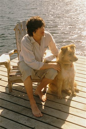 Man on Dock with Dog Stock Photo - Rights-Managed, Code: 700-00618686