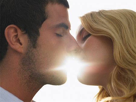 sun care - Couple Kissing Stock Photo - Rights-Managed, Code: 700-00610094