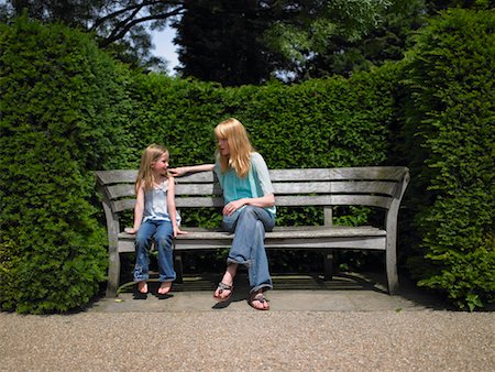 Mother and Daughter Sitting on Bench Stock Photo - Rights-Managed, Code: 700-00610101