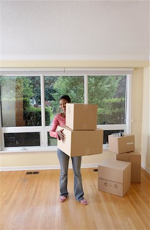 Woman Moving into New Home Stock Photo - Rights-Managed, Code: 700-00610773