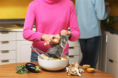eggplant parmesan - Couple Preparing Dinner Stock Photo - Rights-Managed, Code: 700-00610846
