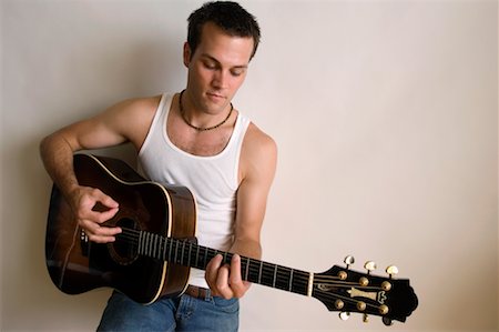 Man Playing Guitar Fotografie stock - Rights-Managed, Codice: 700-00611018