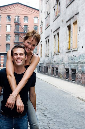 Man Carrying Woman on Back Stock Photo - Rights-Managed, Code: 700-00611036