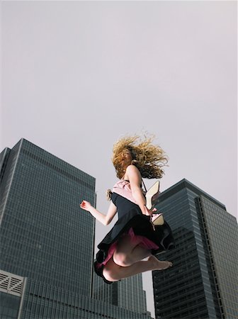 simsearch:700-00039942,k - Woman Jumping in City Stock Photo - Rights-Managed, Code: 700-00611198