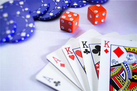 Chips, Dice, and Full House Poker Hand Stock Photo - Rights-Managed, Code: 700-00620224