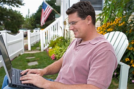 Man Using Laptop Outdoors Stock Photo - Rights-Managed, Code: 700-00623004