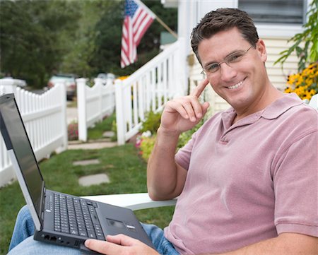 Man Using Laptop Outdoors Stock Photo - Rights-Managed, Code: 700-00623005