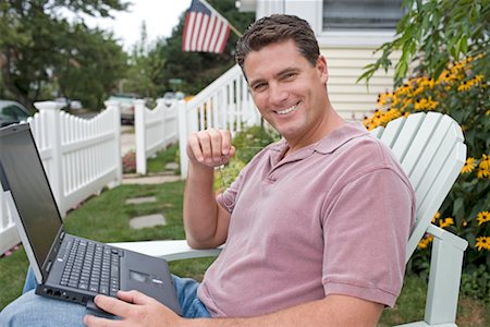 Man Using Laptop Outdoors Stock Photo - Rights-Managed, Code: 700-00623006